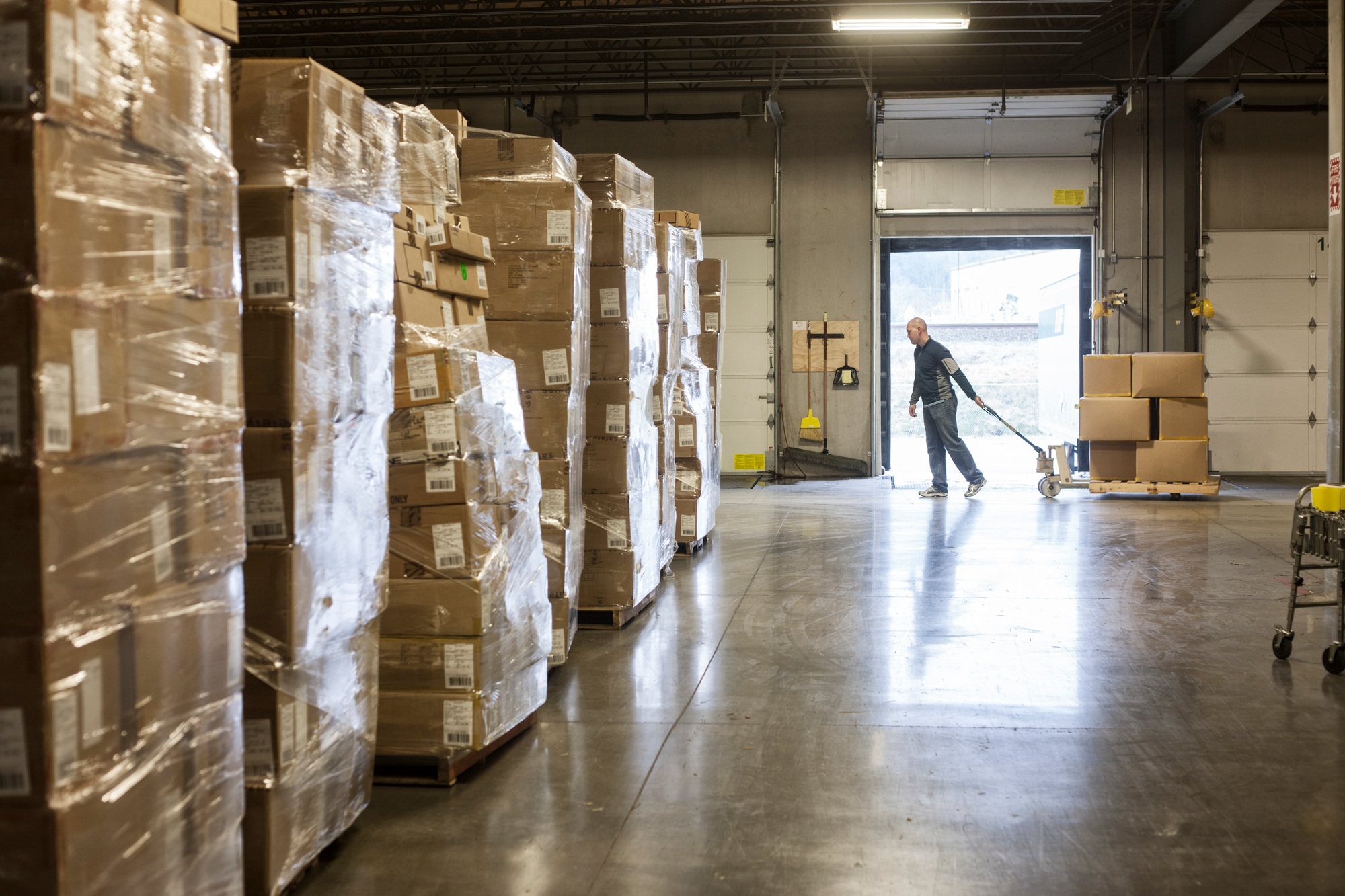 Worker sorting boxes